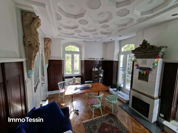 RENDITEOBJEKT: Elegante & sanierte Jugendstilvilla mit 6 Wohnungen und Garten an zentraler top Lage in Muralto 8