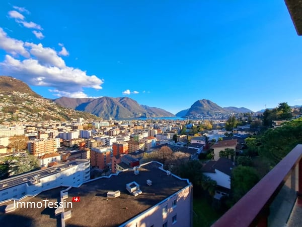 GELEGENHEIT: Luxuswohnung an top Lage mit Pool & Seesicht über Lugano auf den Lago Lugano 1