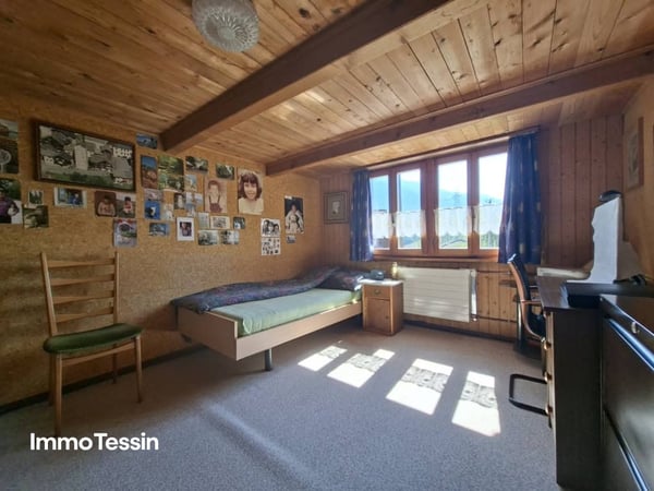 Gemütliches & liebevoll ausgebautes Tessiner Refugium, Doppel-Einfamilienhaus mit Grottino, Werkstatt und Cheminée 11