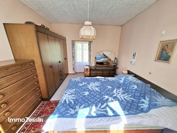 Haus mit 2 Wohnungen an ruhiger Lage und fantastischer Weitsicht ins Grüne sowie grossem Garten 11