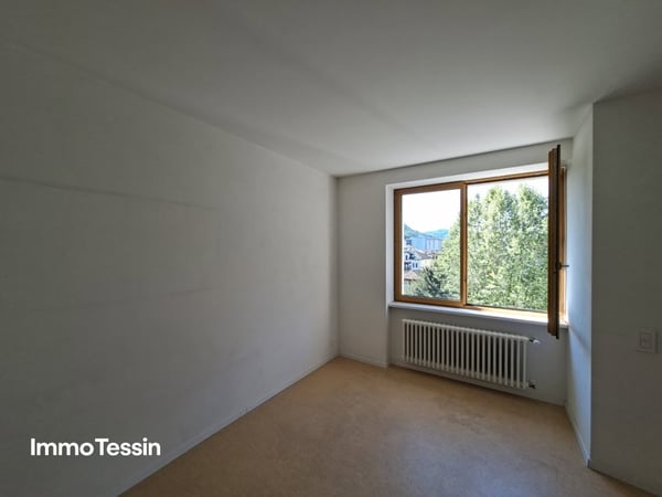 Attraktive Anlageimmobilie mit 19 Wohnungen und Gewerbe an zentraler top Lage in Chiasso 12