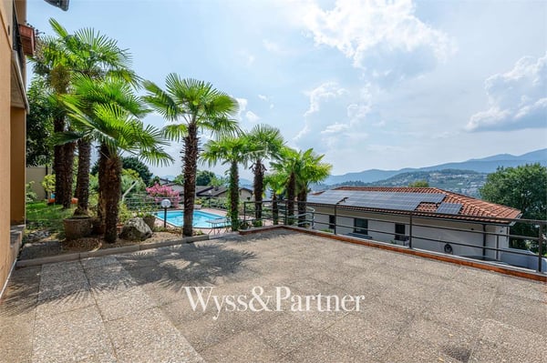3,5 locali con giardino privato, terrazza e piscina a Pregassona 10
