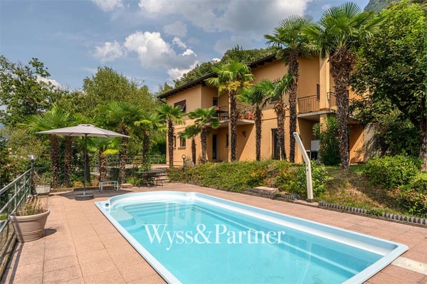 3,5 locali con giardino privato, terrazza e piscina a Pregassona