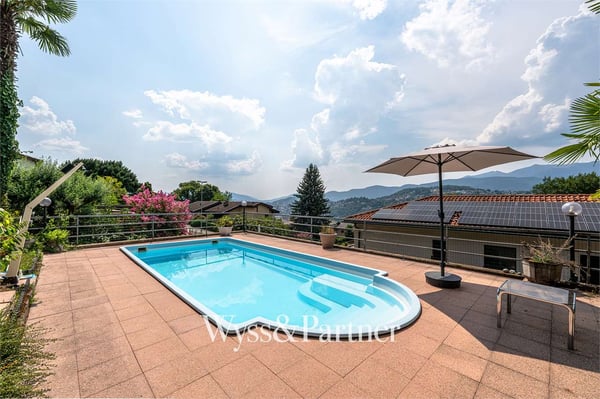 3,5 locali con giardino privato, terrazza e piscina a Pregassona 11