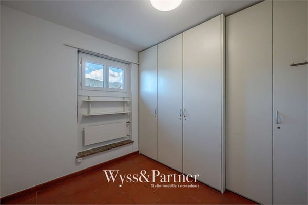 Casa su 3 livelli con terrazza e giardino a Vezia 12