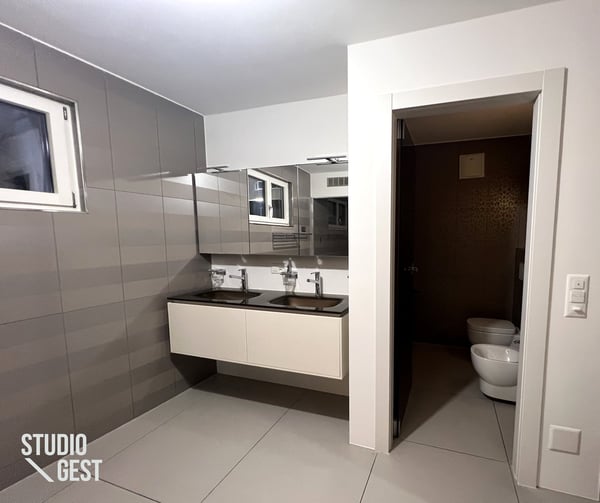 Elegante attico con grandissima terrazza coperta 24