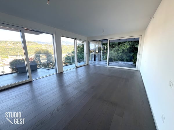 Elegante attico con grandissima terrazza coperta 14