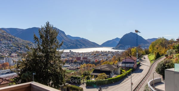 Elegante Attico con Vista Aperta e Piscina Panoramica – Porza (Lugano) 2