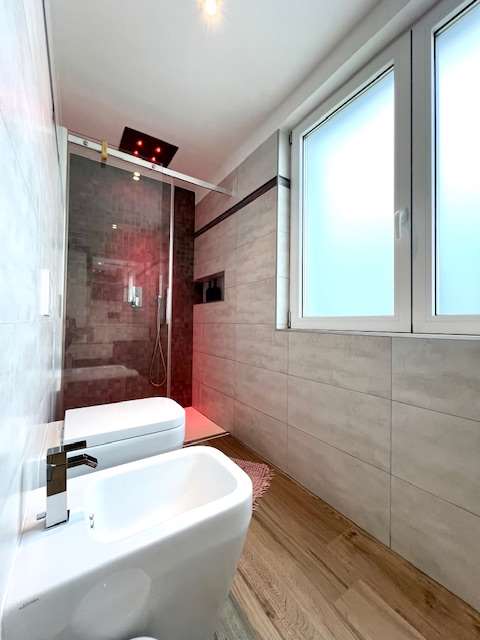 Elegante casa bifamiliare con giardino 11