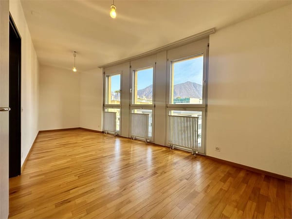 Elegante Attico Duplex con parziale vista lago 11