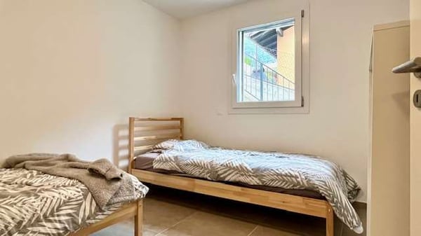 Appartamento nuovo 4,5 locali con giardino 12
