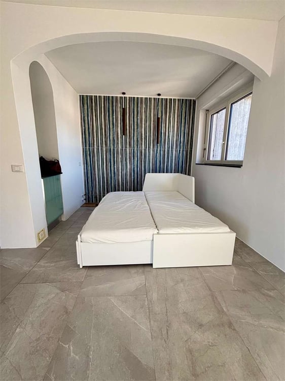 elegante 1 locali ultimo piano con splendida vista 7