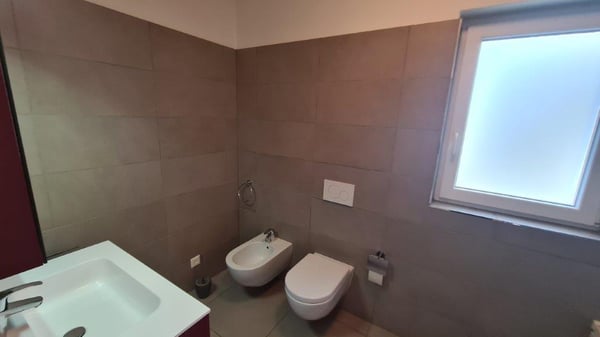 MENDRISIO: GRANDE 1.5 LOC. CON PORTICO E GIARDINO PRIVATO 8