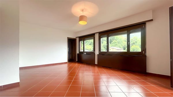 MELANO: CASA PLURIFAMILIARE CON VISTA LAGO 10