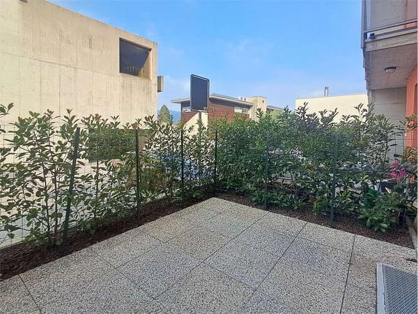 Melano: piacevole maisonette di 3,5 locali con terrazze e parcheggi 3
