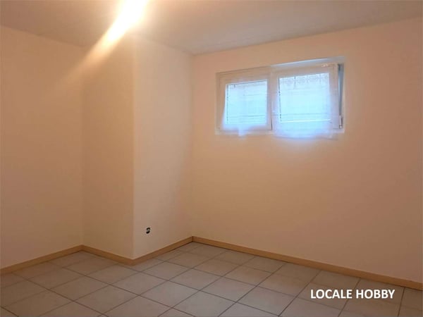 Melano: piacevole maisonette di 3,5 locali con terrazze e parcheggi 9