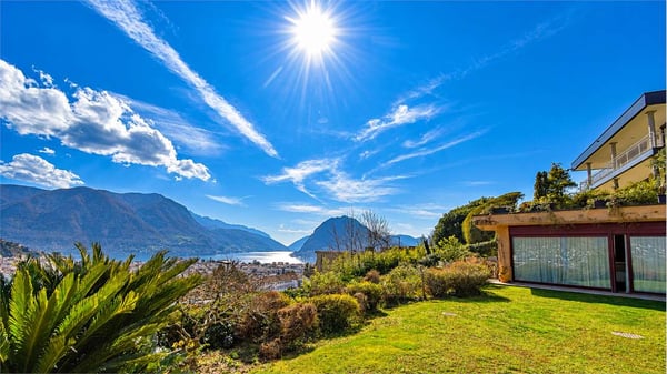 PRESTIGIOSO APPARTAMENTO CON GIARDINO E VISTA LAGO 1