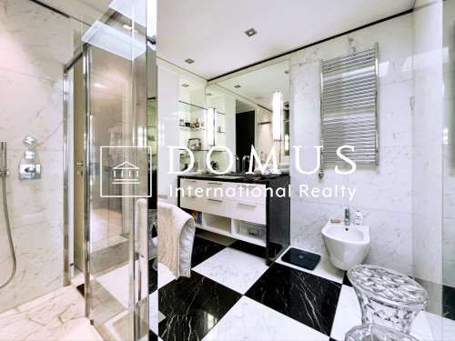 Attico con vista lago a pochi passi dal Tasis 9