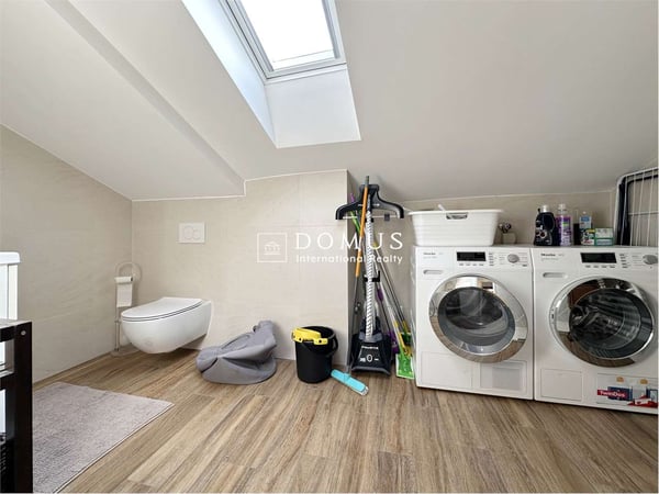 Attico duplex nel cuore pulsante della città 13