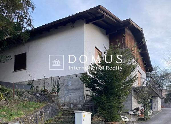 Terreno edificabile 1700m2 con casa in posizione collinare 1