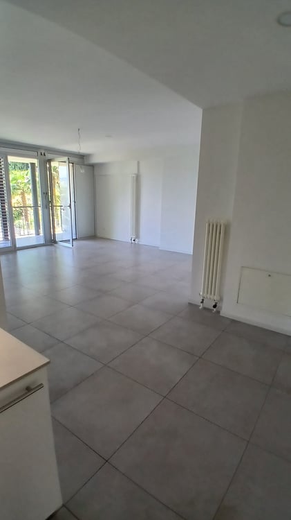 Moderno appartamento 2.5 locali con terrazza e giardino privato a Pazzallo 6
