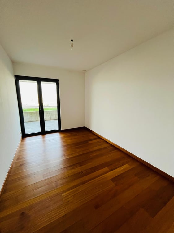Appartamento di 3.5 locali con giardino e vista lago 8