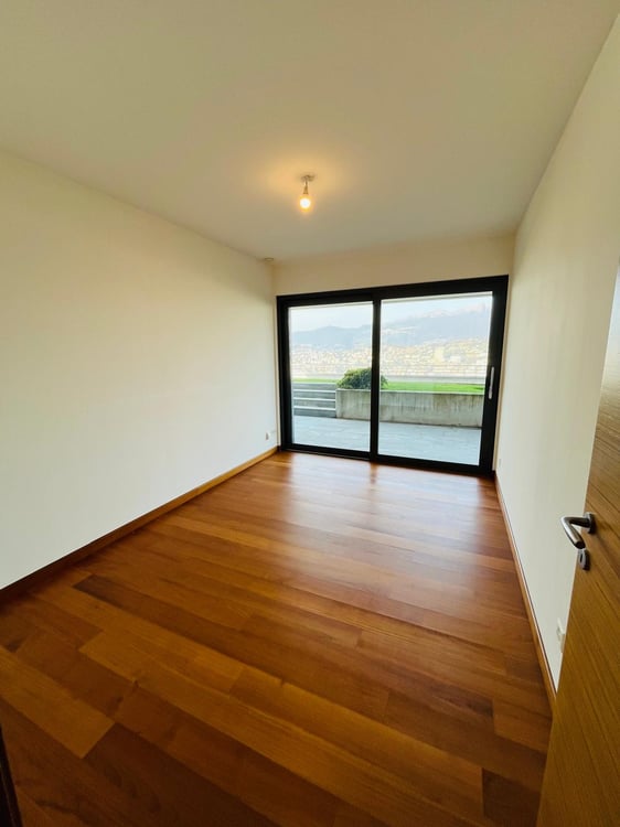 Appartamento di 3.5 locali con giardino e vista lago 7