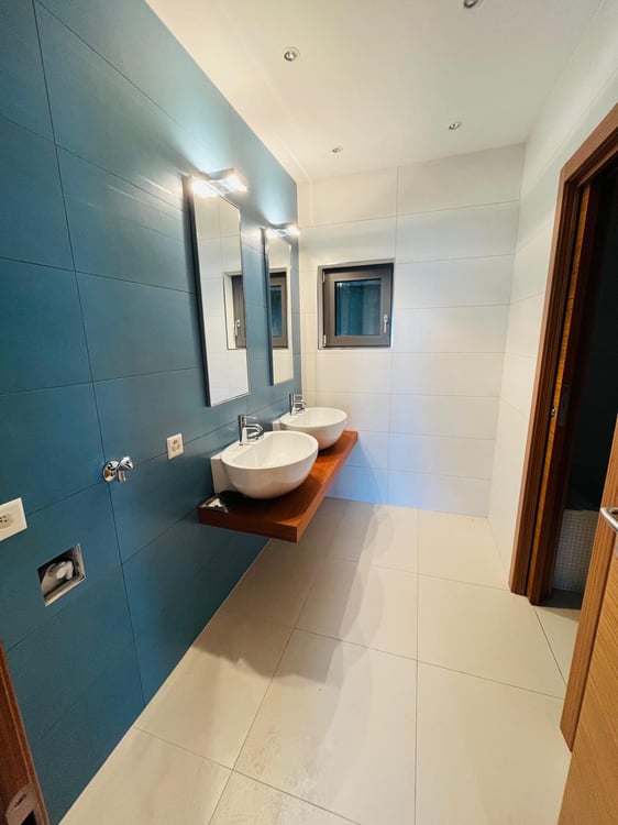 Appartamento di 3.5 locali con giardino e vista lago 9