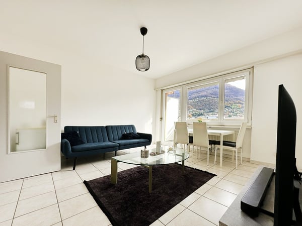 Bellissimo 1.5 locali con balcone coperto e vista aperta sulla città 1