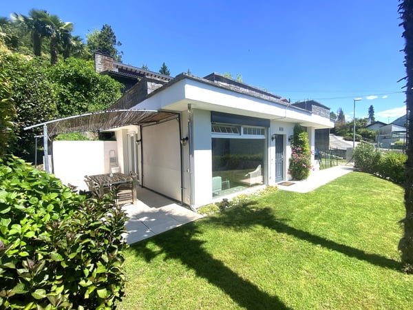 Casa 2,5 locali ristrutturata con vista Ceresio, giardino e parcheggi 1