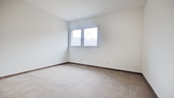 Casa 4,5 locali in contesto bifamiliare con giardino privato. 8