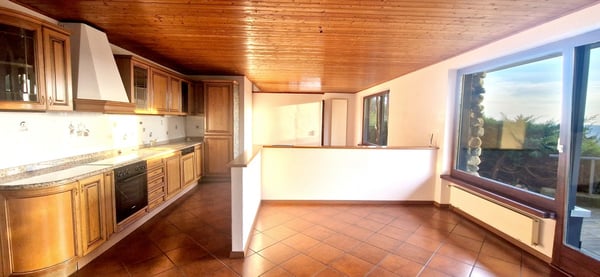 Duplex 4,5 in bifamiliare con panorama, giardino privato e grottino. 3