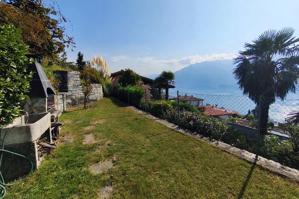 Villa unifamiliare 5,5 vista lago con giardino e camino 16