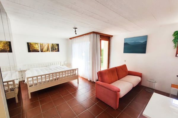 Villa unifamiliare 5,5 vista lago con giardino e camino 9