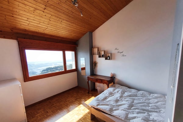 Villa unifamiliare 5,5 vista lago con giardino e camino 12