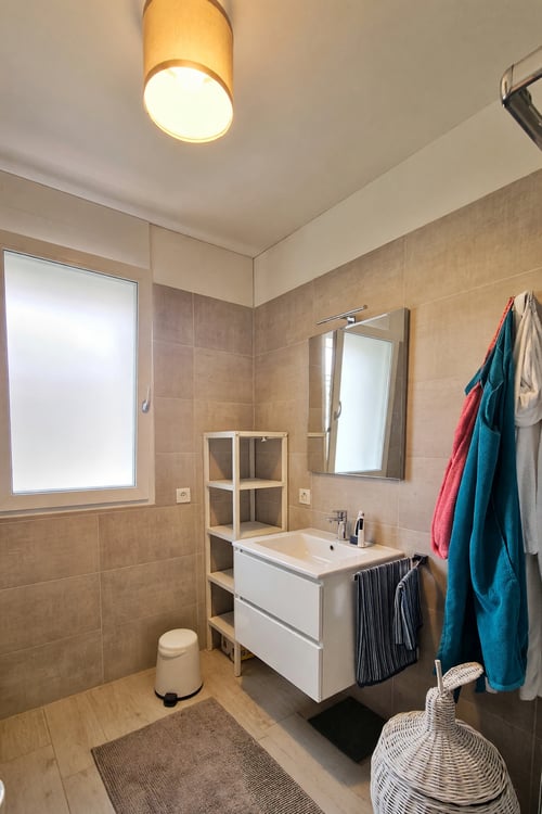 Moderno 3.5 con terrazza coperta e ottime possibilità di reddito 14