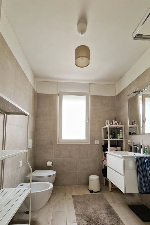 Moderno 3.5 con terrazza coperta e ottime possibilità di reddito 13