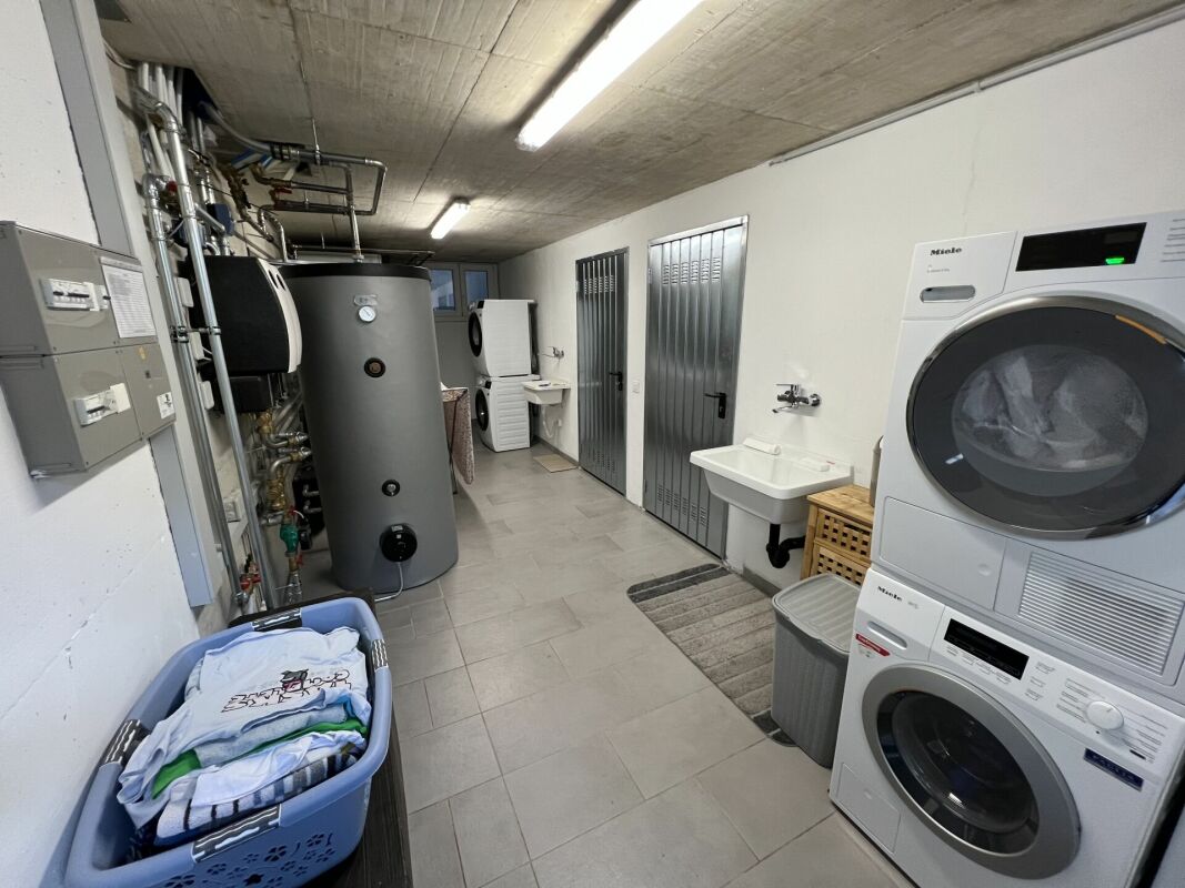 Moderna casa bifamiliare individuale, di 4.5 +3.5 locali con ampio giardino