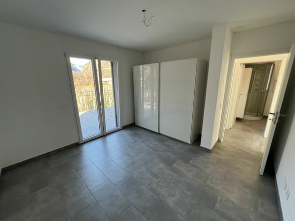 Moderna casa bifamiliare individuale, di 4.5 +3.5 locali con ampio giardino 13