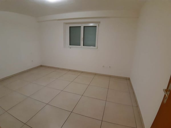 Casa Bifamiliare di 2.5+5.5 locali con terreno 13