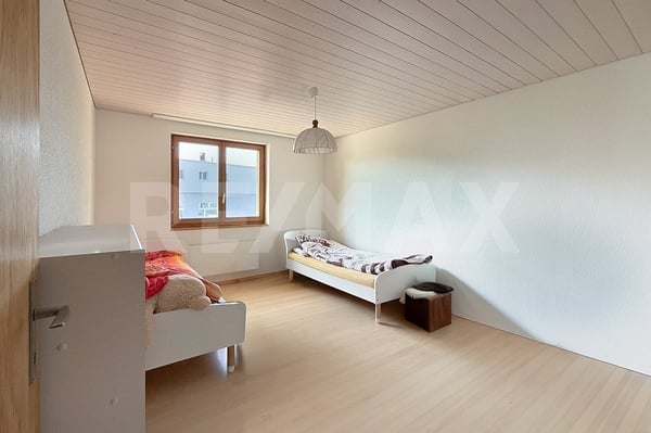 Dreifamilienhaus mit Gewerbefläche - in gemischter Wohn- und Gewerbezone 12