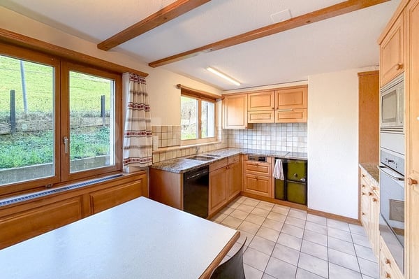 Dreifamilienhaus mit Gewerbefläche - in gemischter Wohn- und Gewerbezone 10