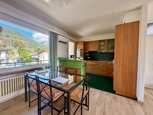 Il tuo rifugio nel verde a Ponte Capriasca: appartamento con piscina e giardino 5