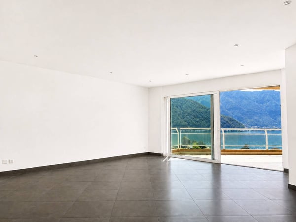 Incantevole appartamento di 3.5 locali con vista lago a Melide 2