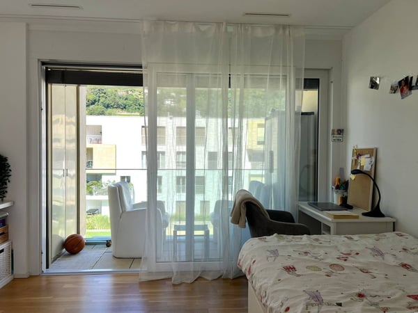 Moderno appartamento 3.5 locali con balcone a Barbengo 12