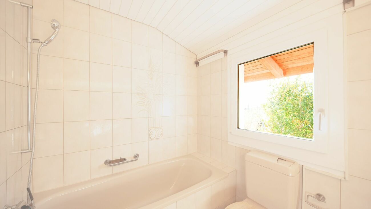 Casa a schiera di 4,5 locali con grande giardino e vista panoramica