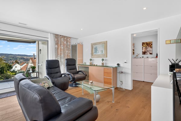 Toplage: Gesamthaus mit 6.5 & 3.5 Zimmer 11