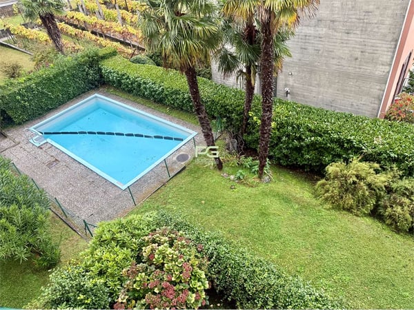 Appartamento con piscina 10