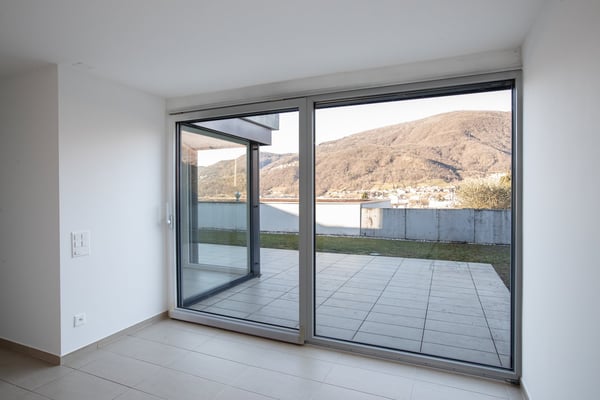 Oasi di prestigio a 10 minuti dal centro di Lugano: Moderno 3.5 locali con ampio giardino 18