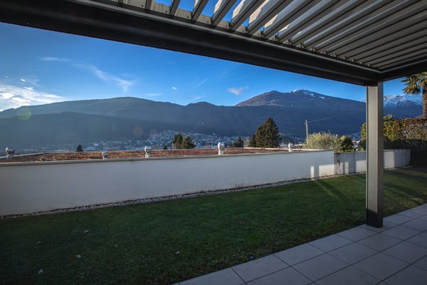 Oasi di prestigio a 10 minuti dal centro di Lugano: Moderno 3.5 locali con ampio giardino 8